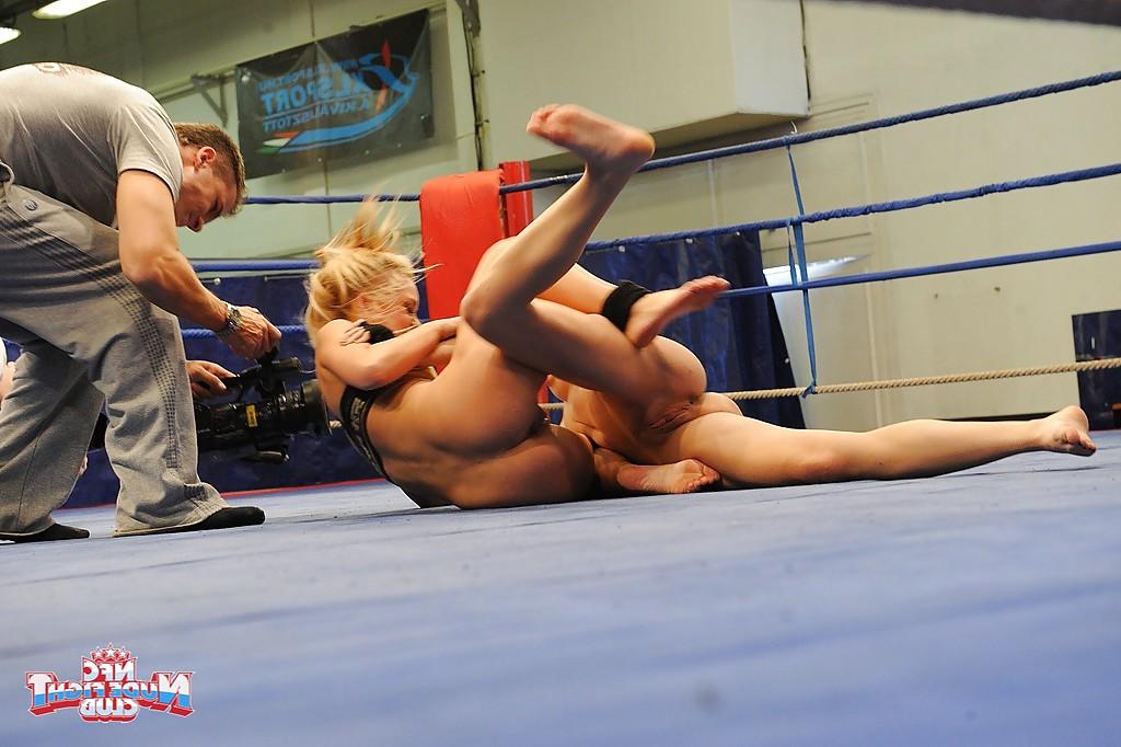 16P Pretty lesbians gasping and stripping each other in the wrestling ring