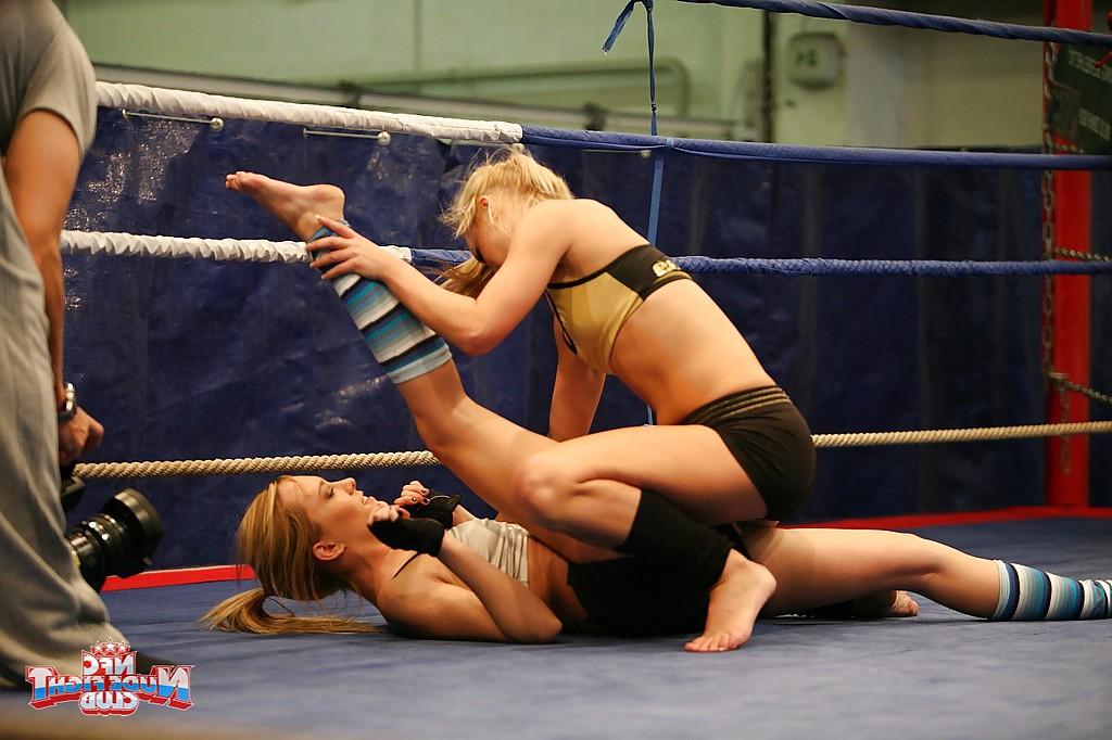 16P Pretty lesbians gasping and stripping each other in the wrestling ring