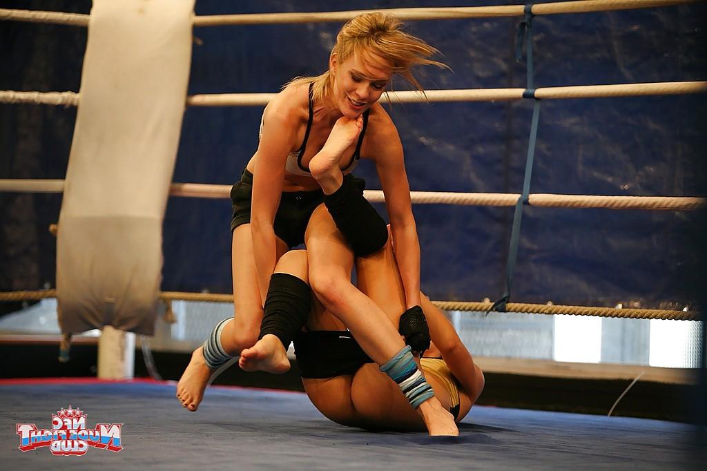 16P Pretty lesbians gasping and stripping each other in the wrestling ring