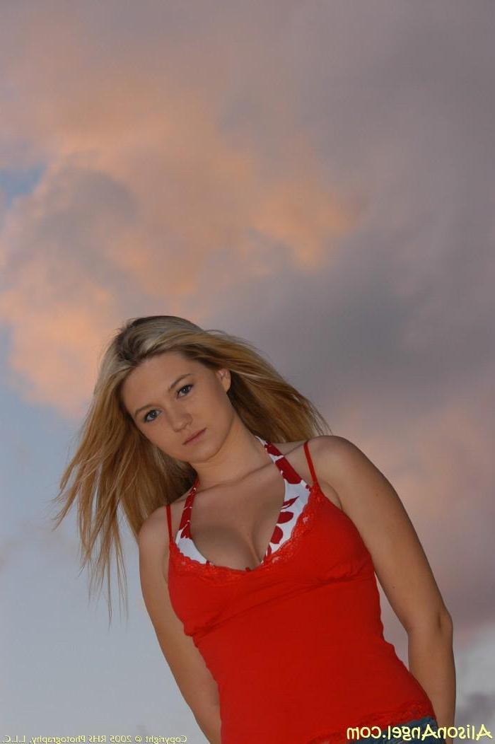 20P Pictures of teen girl Alison Angel flashing her tits on a beach