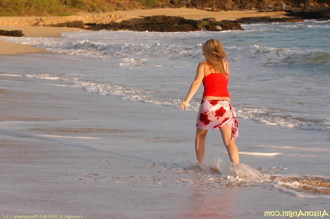 20P Pictures of teen girl Alison Angel flashing her tits on a beach