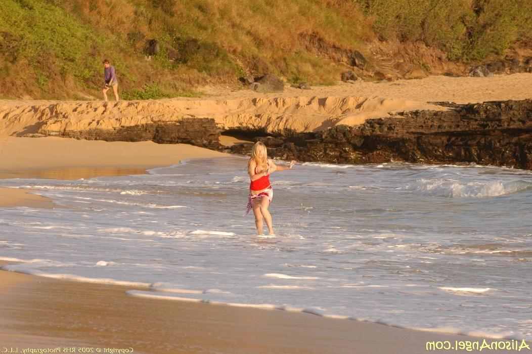 20P Pictures of teen girl Alison Angel flashing her tits on a beach