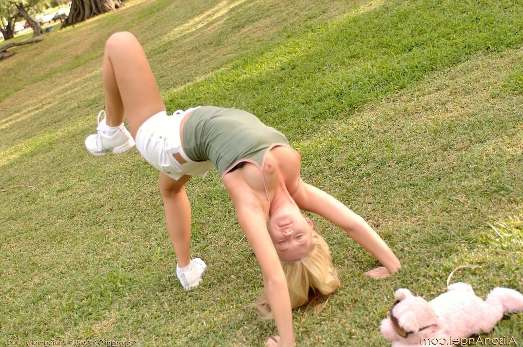 20P Pictures of teen amateur Alison Angel flashing you her pussy outside