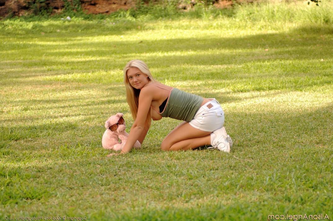 20P Pictures of teen amateur Alison Angel flashing you her pussy outside