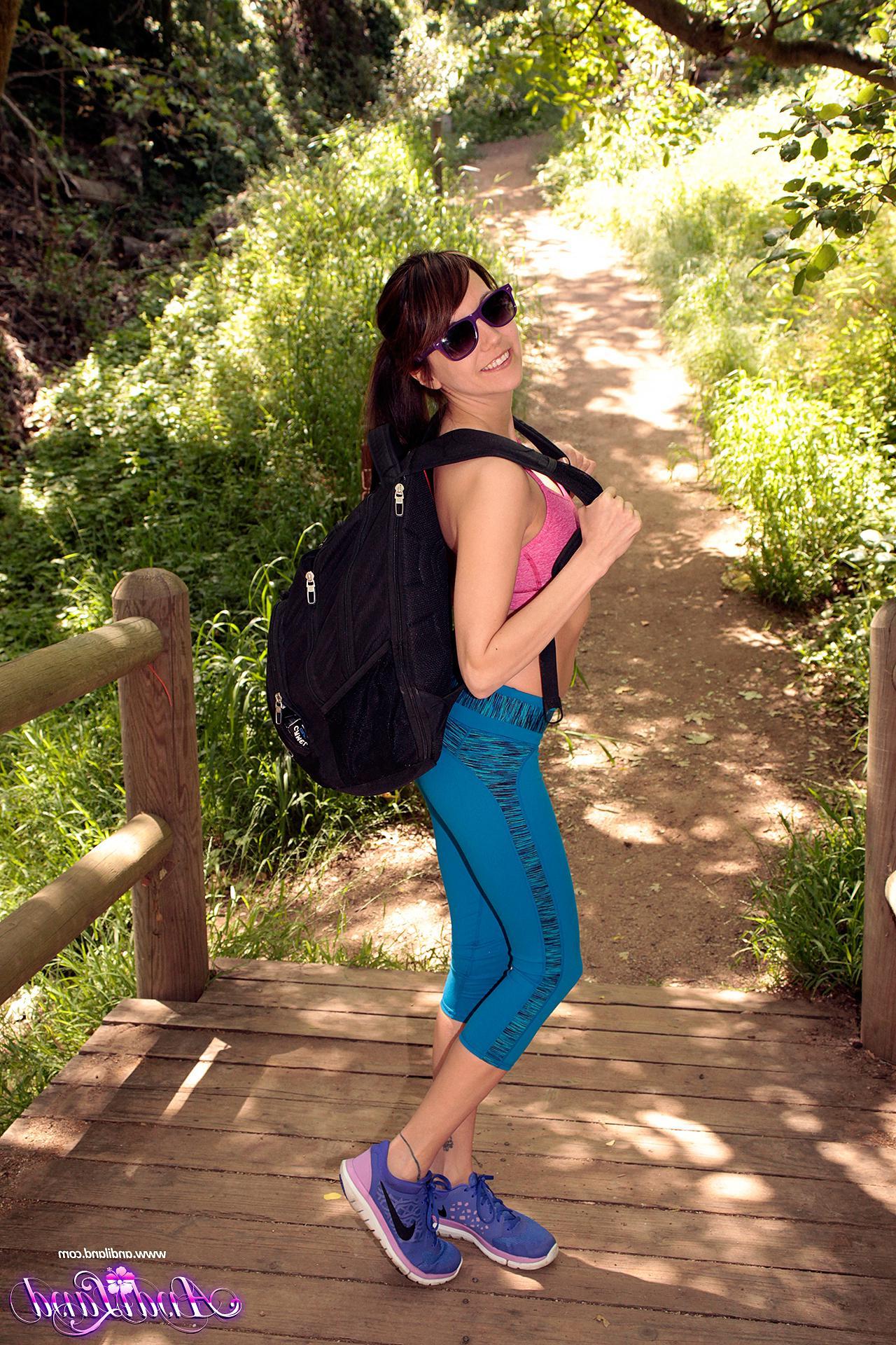 15P Brunette coed Andi flashes her tits and ass on a hiking trip