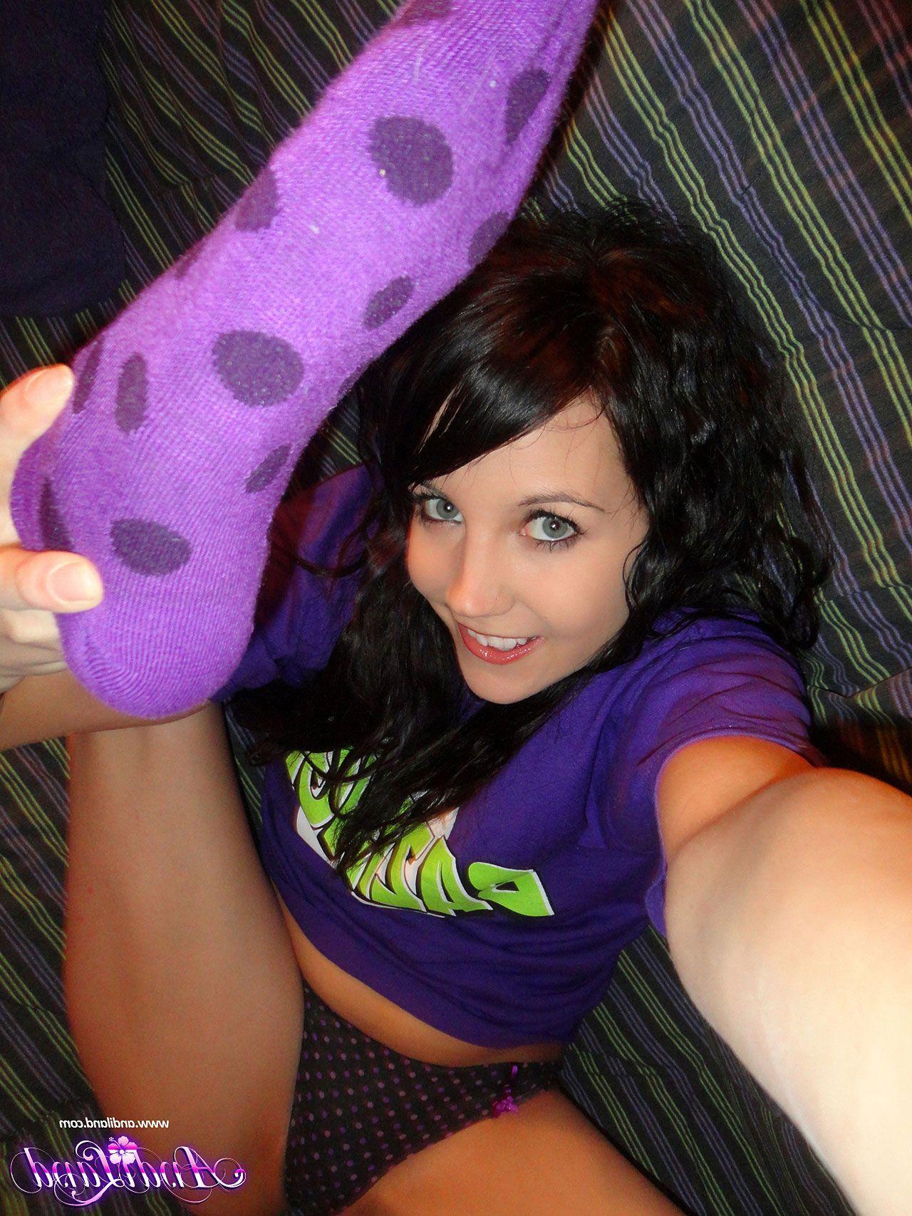 15P Pictures of Andi flashing in her purple shirt and socks