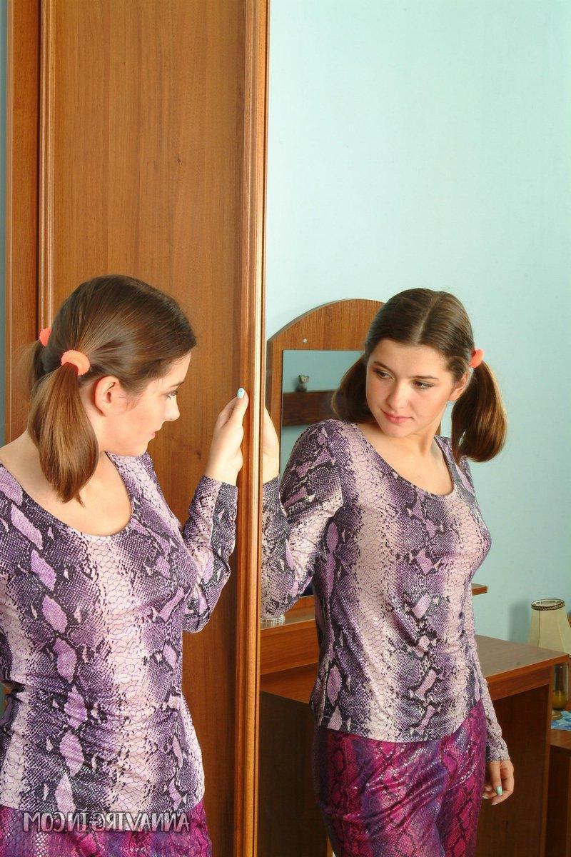 16P Pictures of teen nympho Anna Virgin stripping to her panties
