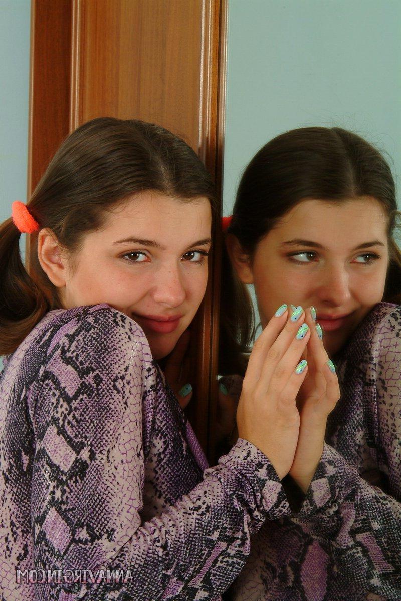 16P Pictures of teen nympho Anna Virgin stripping to her panties