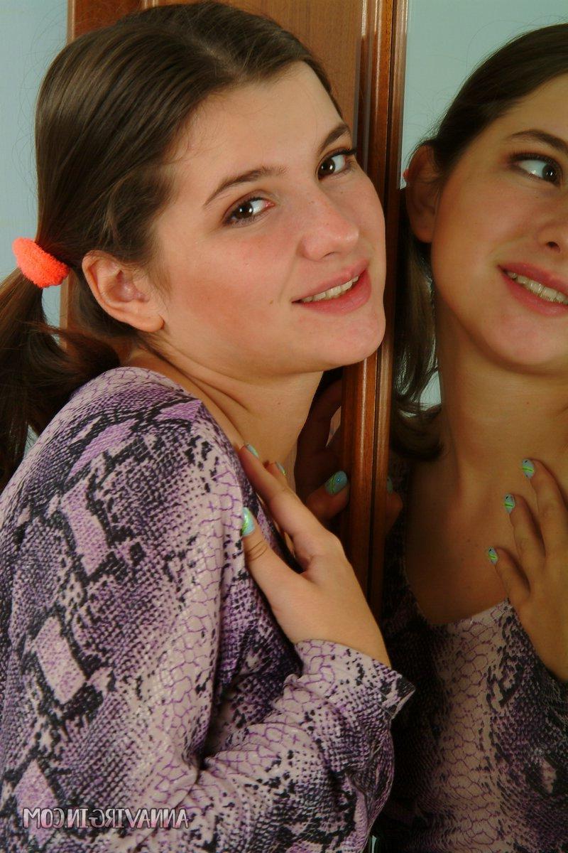 16P Pictures of teen nympho Anna Virgin stripping to her panties