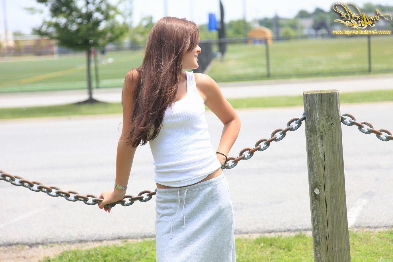 16P Pictures of Annabelle Angel flashing her boobs outside