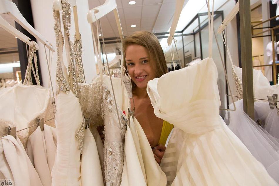 8P Hot coed April Brookes gives you some peeks up her skirt at a public mall