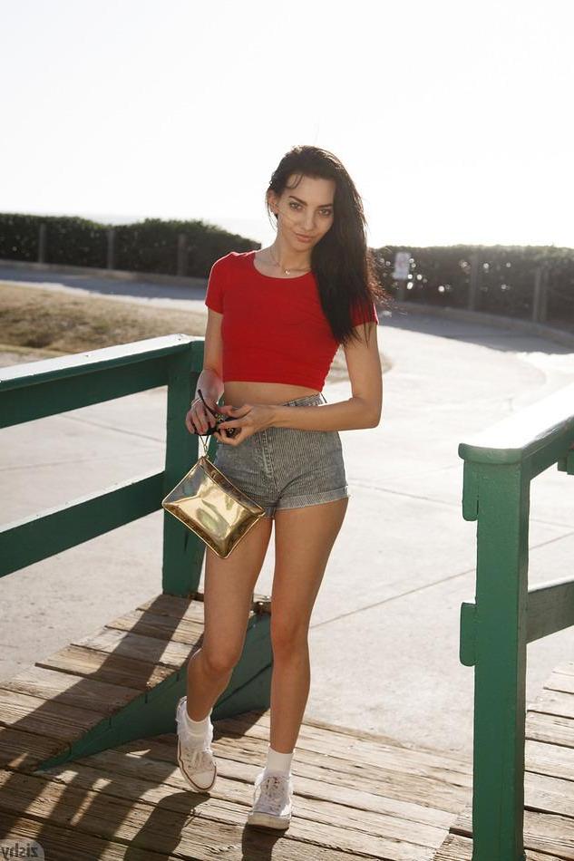 8P Petite coed Araya Costa teases with her tight body on the beach