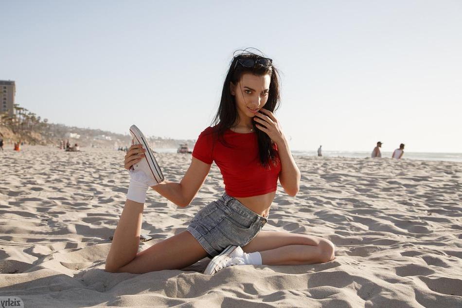 8P Petite coed Araya Costa teases with her tight body on the beach