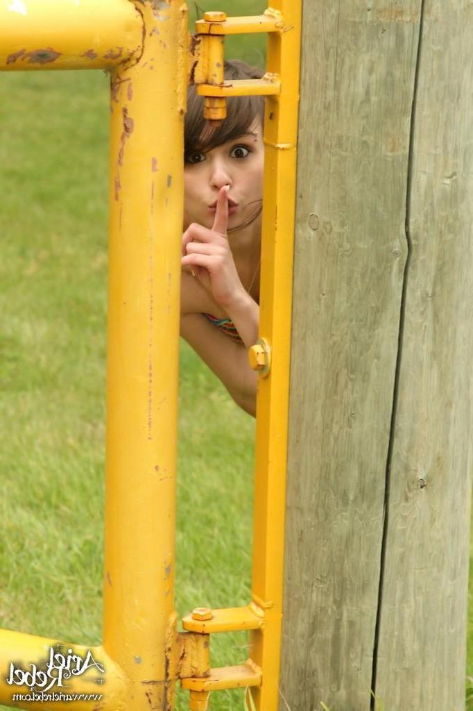 15P Pictures of Ariel Rebel flashing her fun parts outside