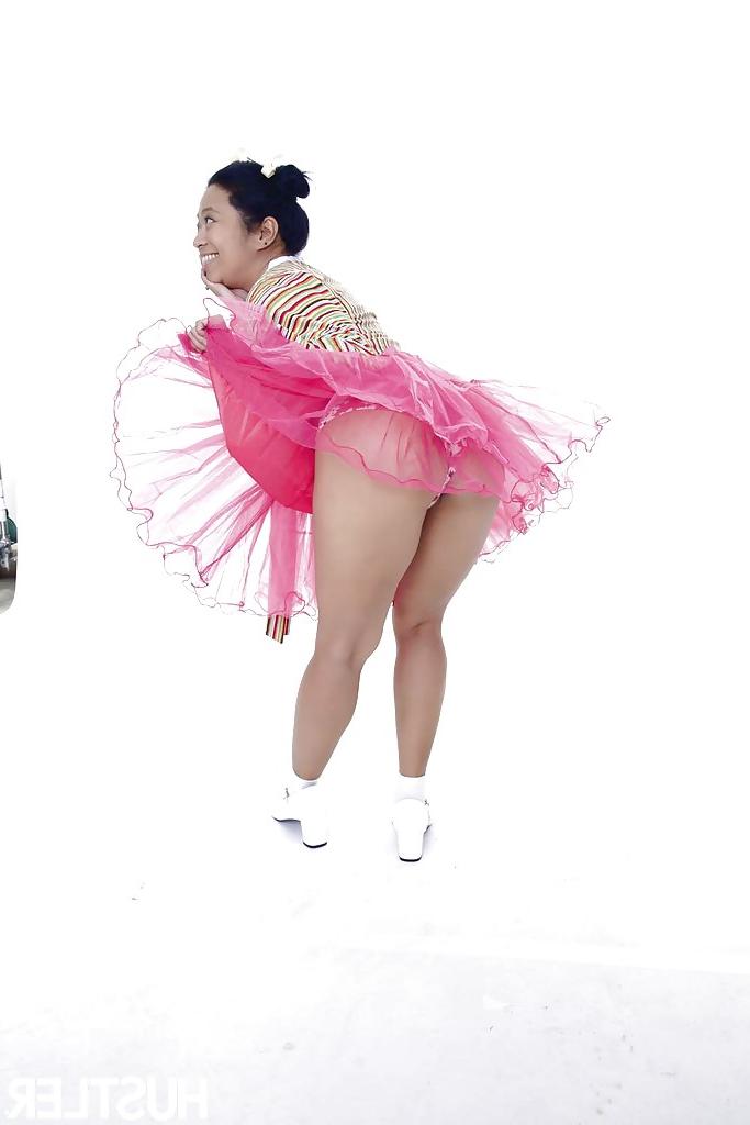 16P Asian pornstar Lucky Starr lifts up cosplay skirt for shaved cunt flashing