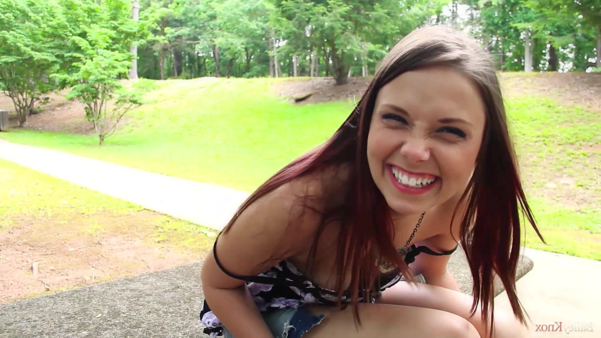 16P Brunette cutie Bailey Knox plays with herself at a park