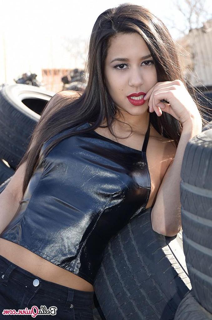 12P Brunette coed Bella Quinn teases at a tire yard