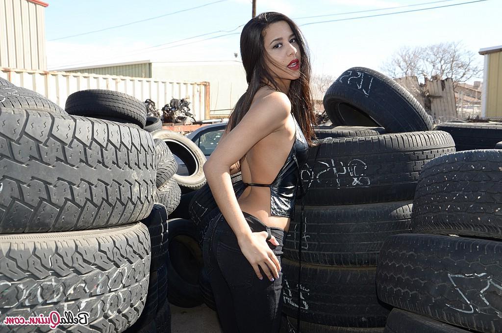 12P Brunette coed Bella Quinn teases at a tire yard