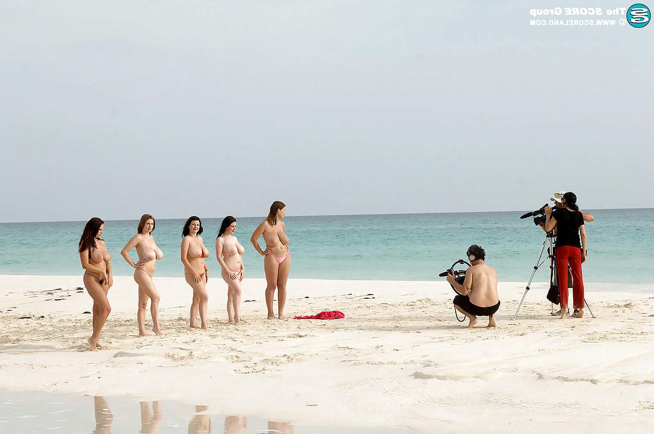 16P Hot MILF women stripping bikinis to bare big tits on the beach