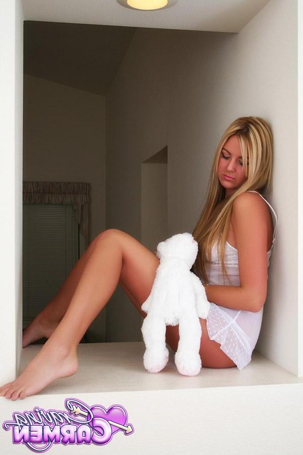 12P Blonde teen Carmen shows off her long sexy legs in a white nighty