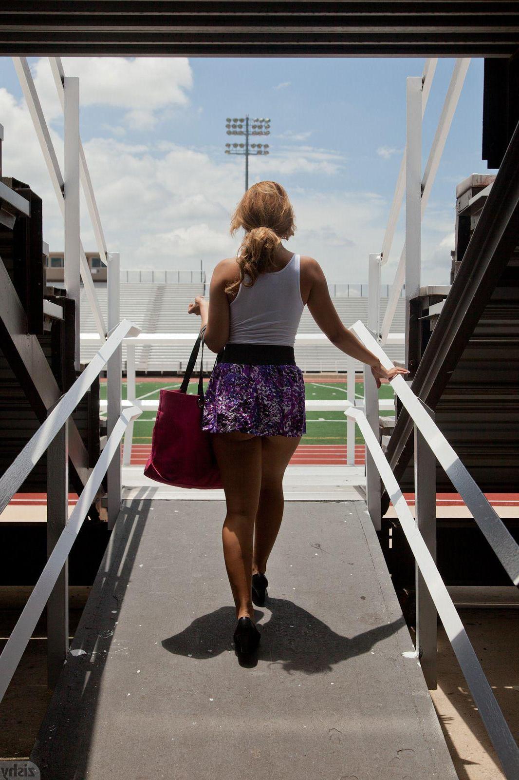 12P Hot coed Cynthia Monte teases at a football stadium in Texas