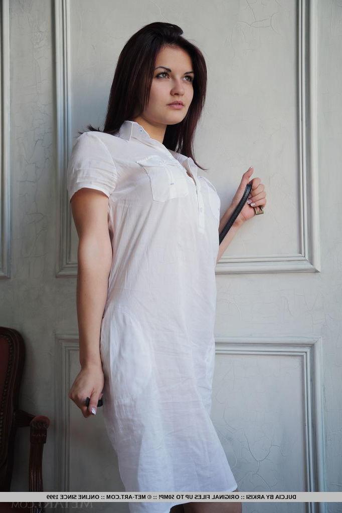 18P Brunette teen Dulcia strips naked and spreads her legs