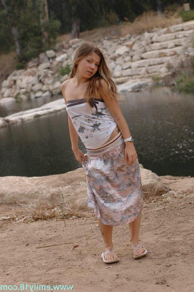 15P Young hotite Emily 18 shows her titties and panties next to a river