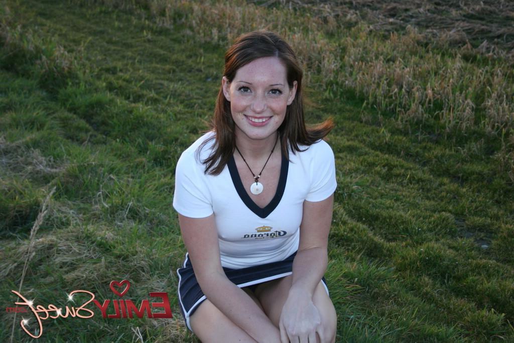20P Pictures of teen Emily Sweet exposing her tits outside