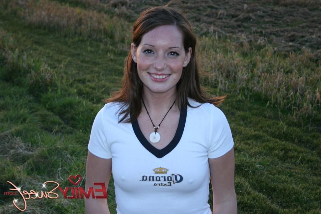 20P Pictures of teen Emily Sweet exposing her tits outside