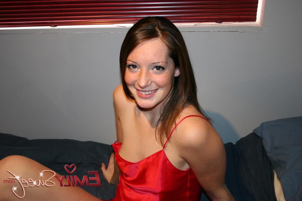20P Pictures of teen cutie Emily Sweet stripping in bed