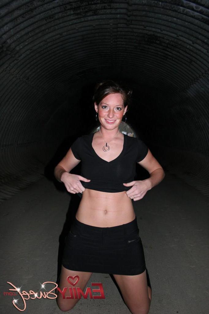 20P Pictures of Emily Sweet exposing her tits in a tunnel
