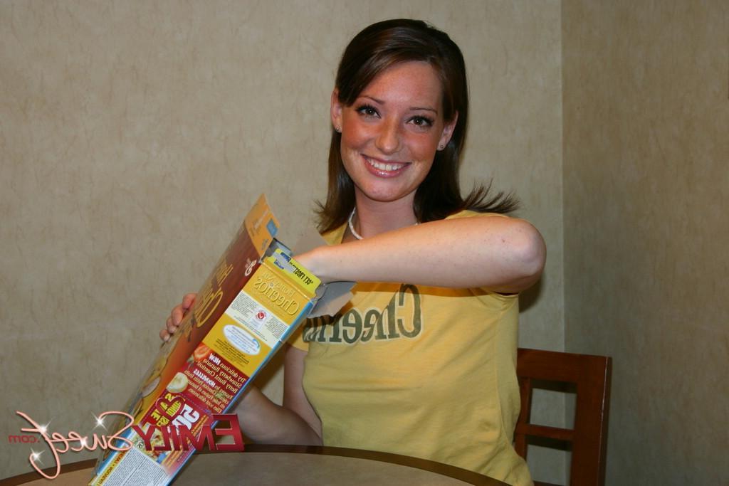 20P Pictures of Emily Sweet showing you her tits