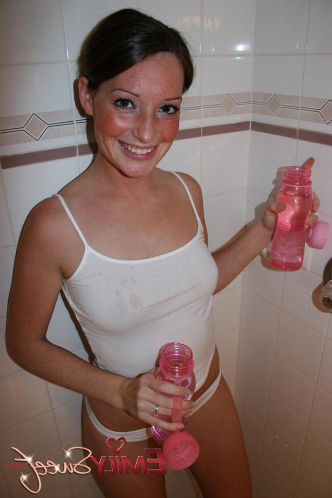 20P Pictures of teen babe Emily Sweet getting all wet for you