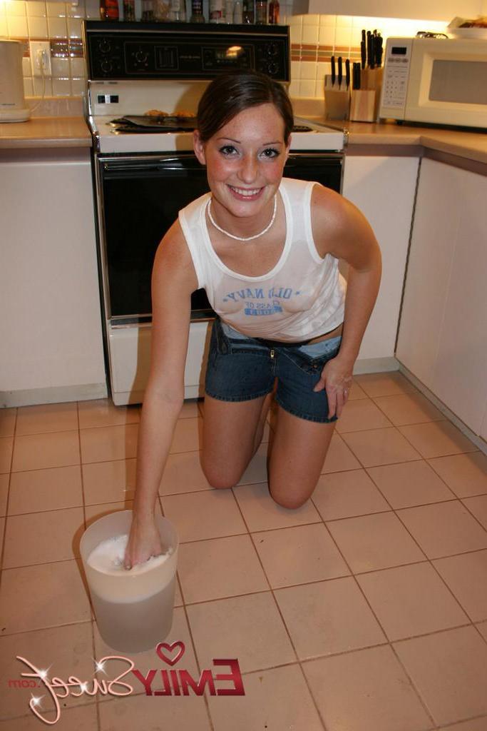20P Pictures of teen Emily Sweet making herself all wet