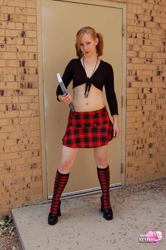 16P Pictures of teen schoolgirl Forever Laura flashing her tits outside