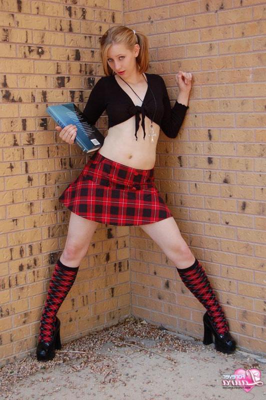 16P Pictures of teen schoolgirl Forever Laura flashing her tits outside