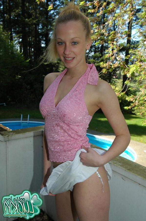 12P Blonde teen Lucky strips down to her white thong in the pool