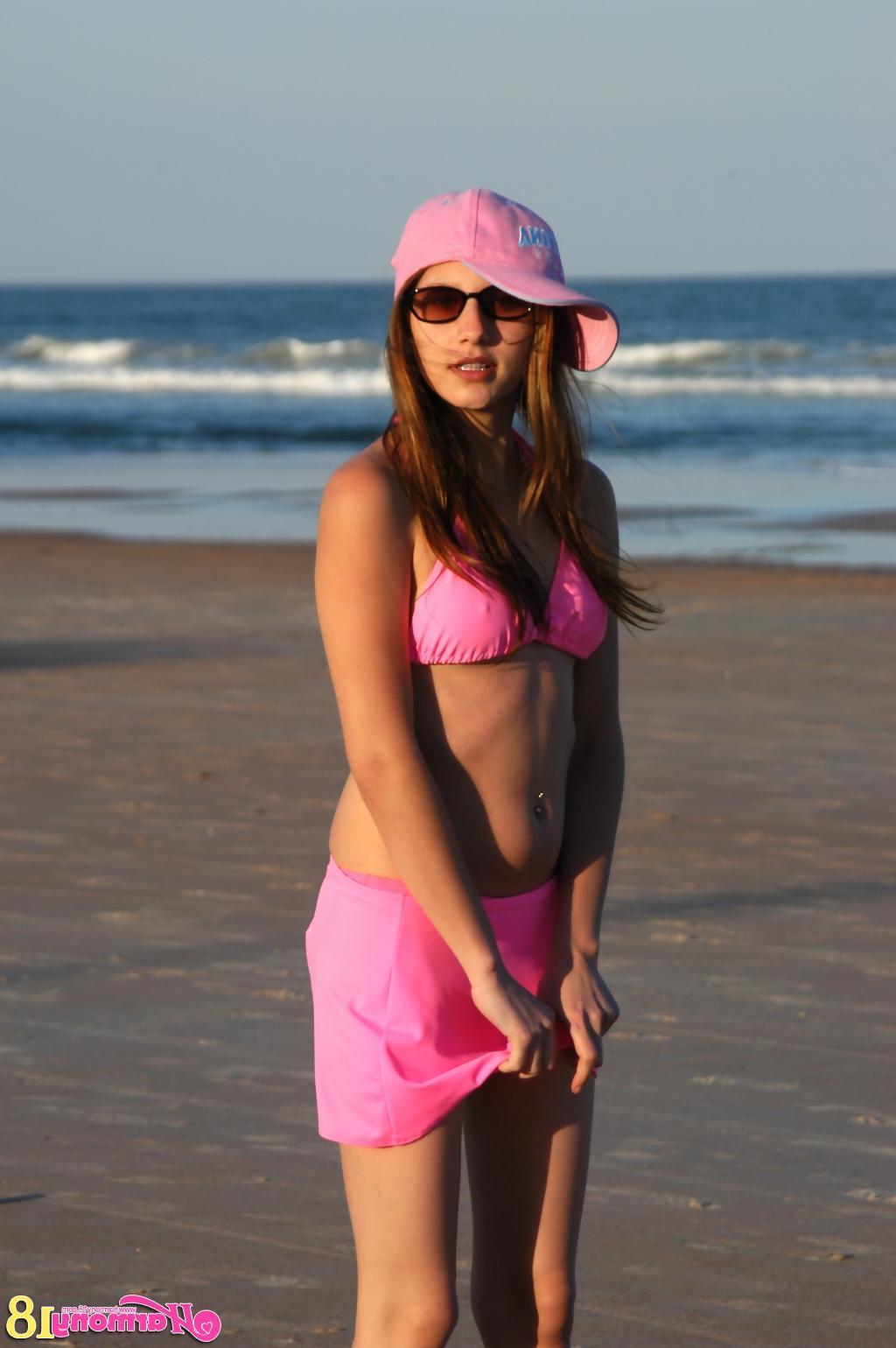 16P Pictures of Harmony 18 flashing her tits on the beach