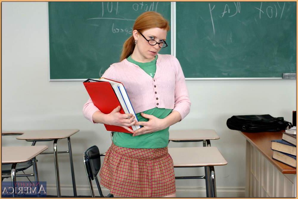 16P Tempting college redhead in glasses Madison Young strips in class