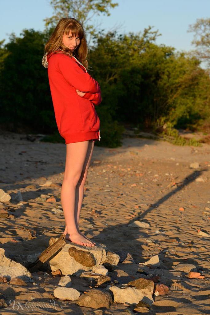 16P Pretty coed Jenny D strips nude for you on the beach in "Sunset"