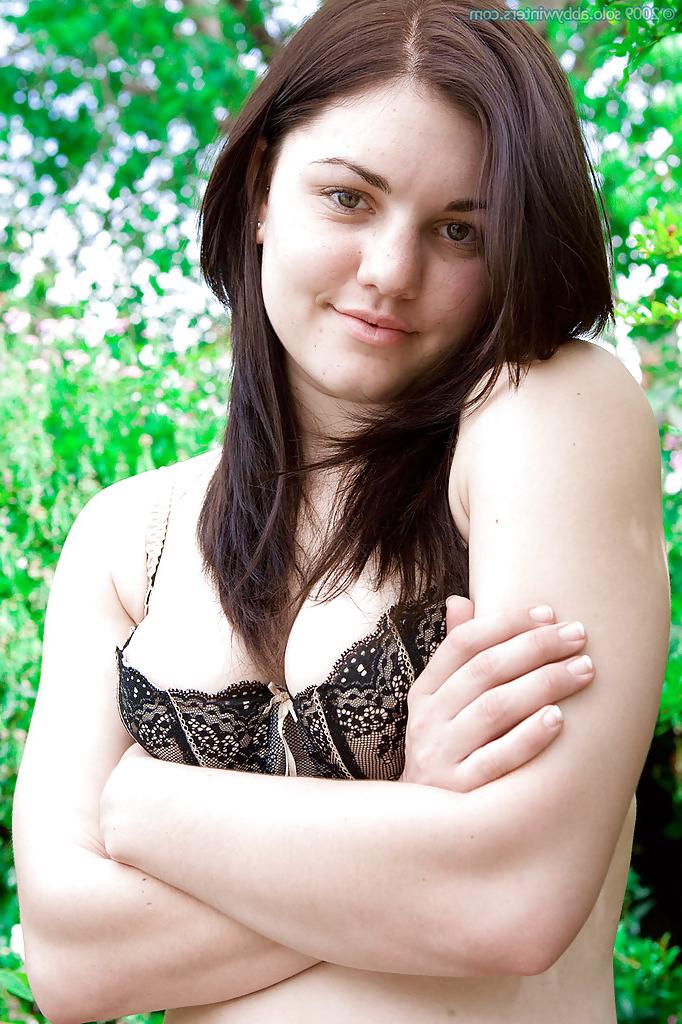 16P Amateur model Roxy pulls down shorts and panties to flash puffy pussy