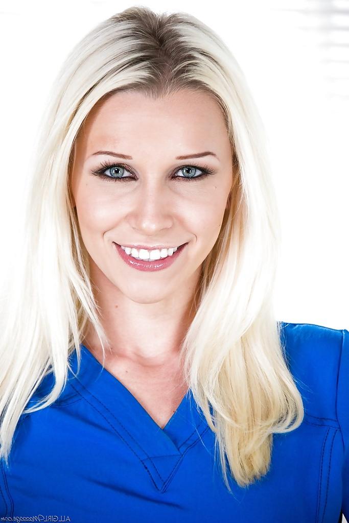 16P Tattooed blondie in nurse uniform undressing and spreading her legs