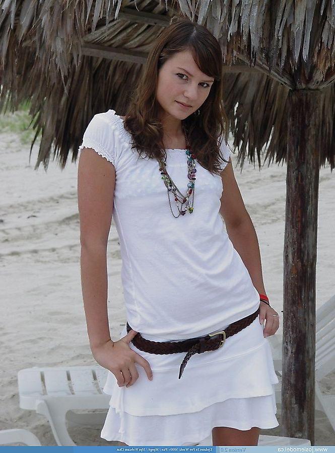 20P Pictures of teen chick Josie Model flashing on a beach
