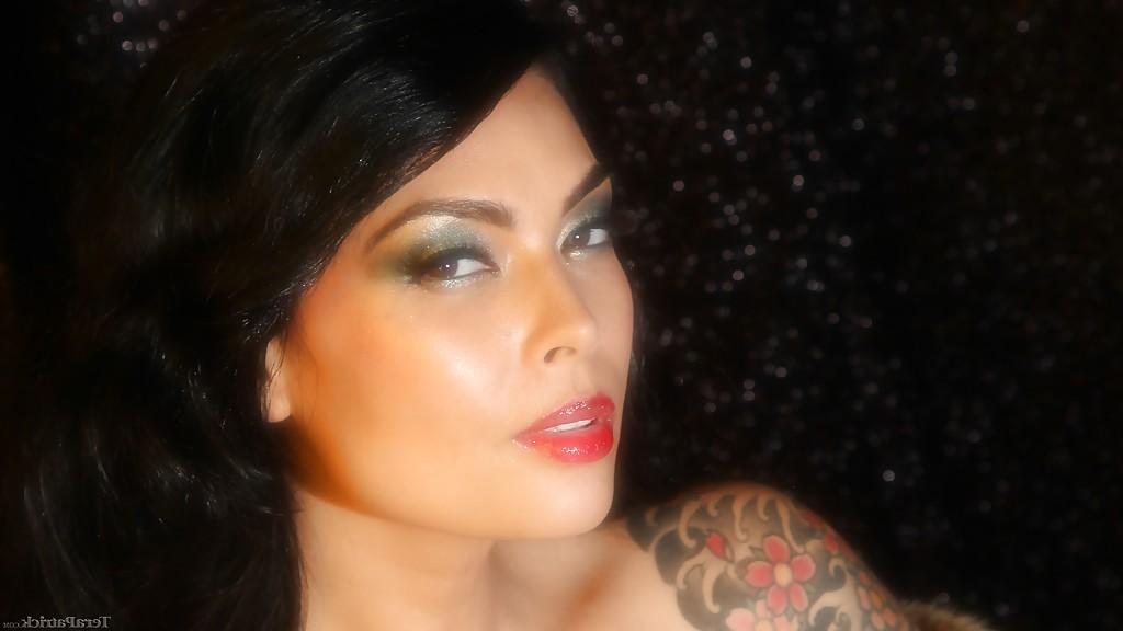 16P Busty Asian babe Tera Patrick letting large natural tits loose
