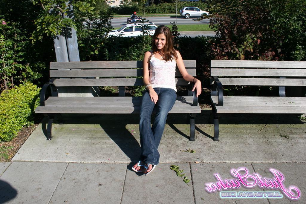 20P Pictures of teen hottie Just Sasha teasing and flashing outside
