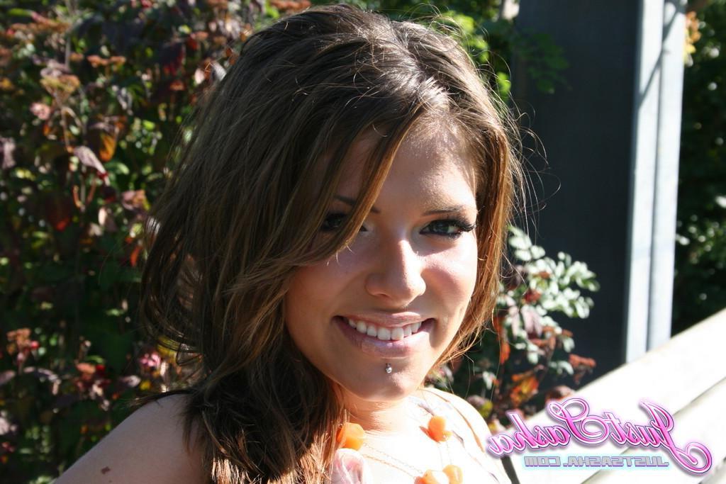20P Pictures of teen hottie Just Sasha teasing and flashing outside