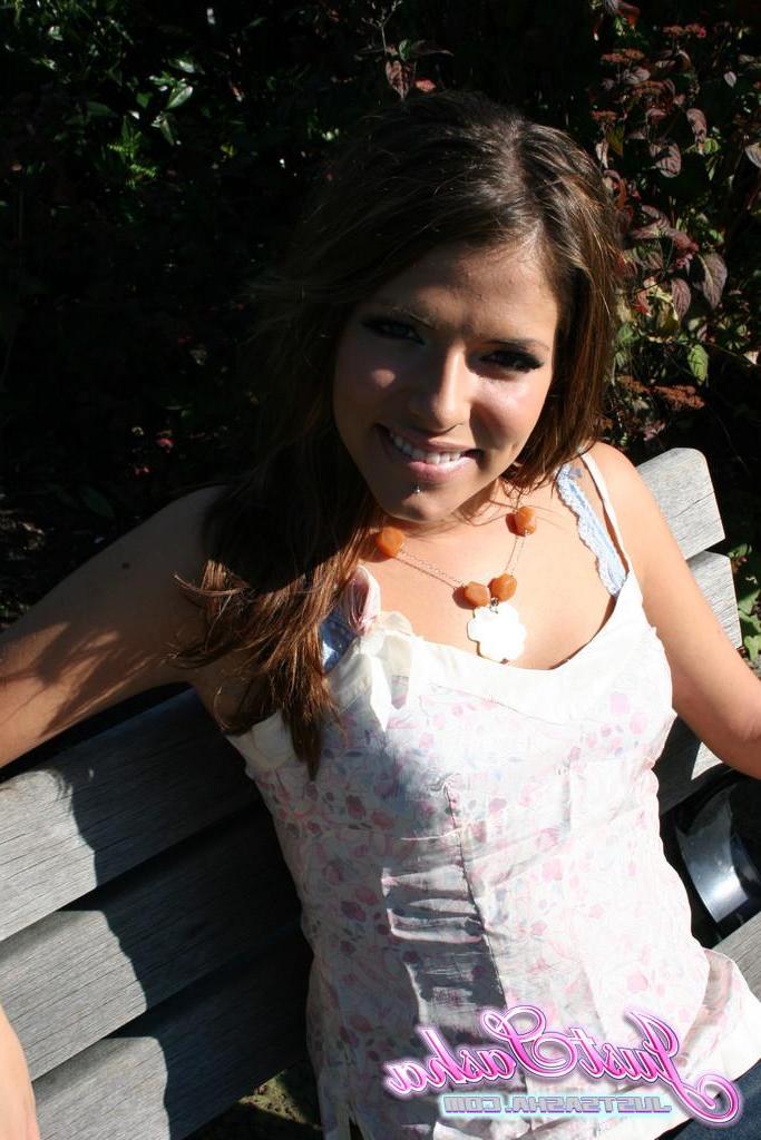 20P Pictures of teen hottie Just Sasha teasing and flashing outside