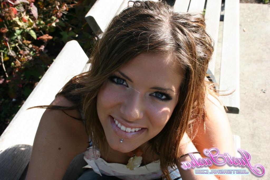 20P Pictures of teen hottie Just Sasha teasing and flashing outside