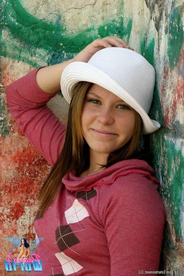 15P Pictures of cute teen Natalie flashing her perky tits and shaved pussy outside