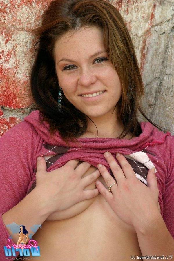 15P Pictures of cute teen Natalie flashing her perky tits and shaved pussy outside